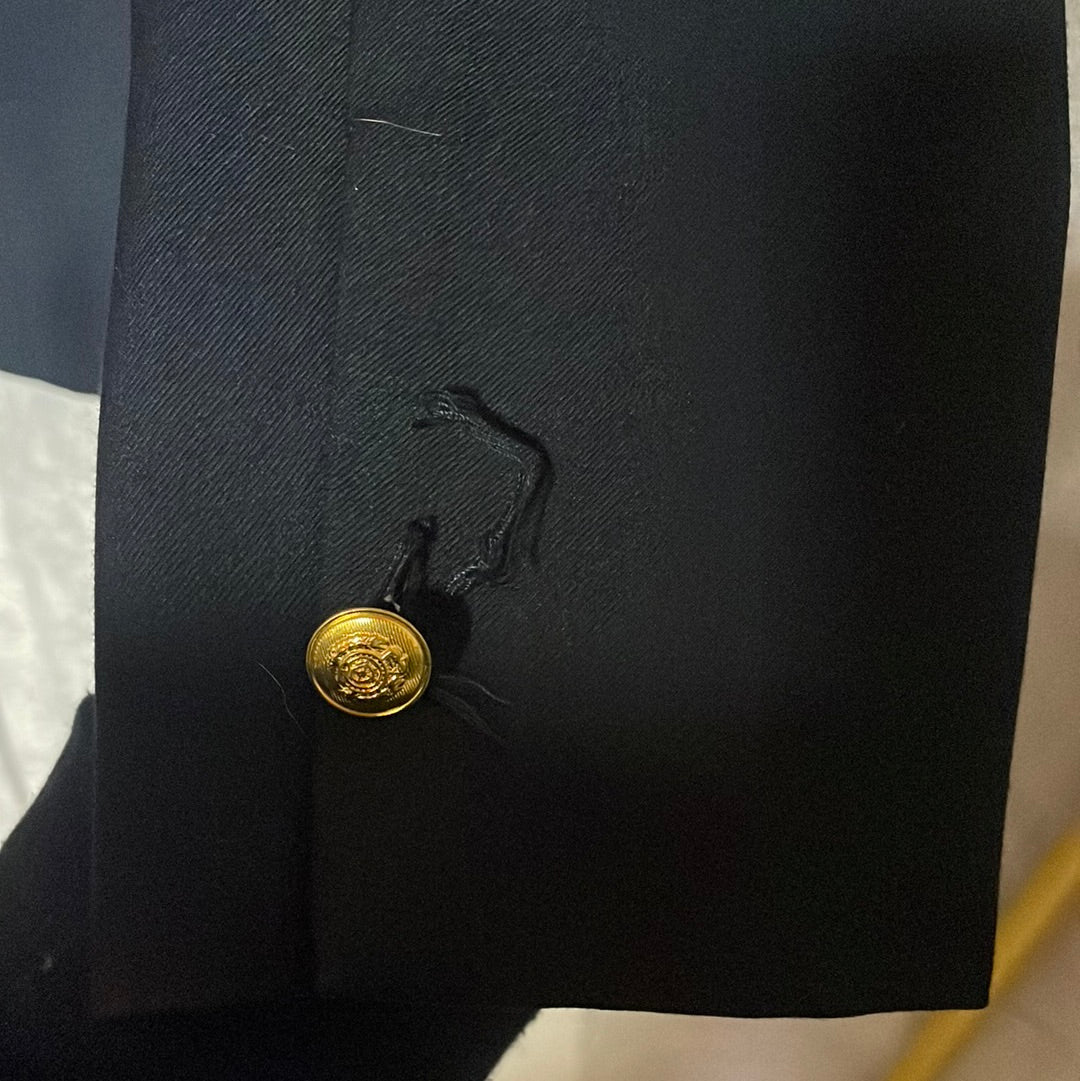 Missing 2 buttons on right sleeve
